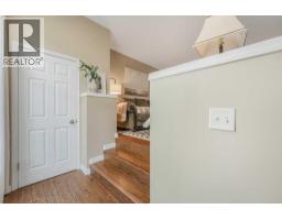Bedroom - 128 Promenade Way Se, Calgary, AB T2Z4E8 Photo 6