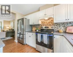 128 Promenade Way Se, Calgary, AB T2Z4E8 Photo 9