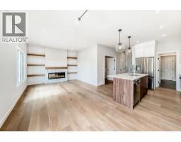 Laundry room - 4 Heritage Mews, Cochrane, AB T4C2J8 Photo 12
