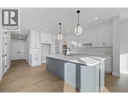 Laundry room - 132 Heritage Ridge, Cochrane, AB T4C3L1 Photo 13