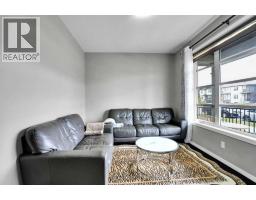 Living room - 9039 52 Street Ne, Calgary, AB T3J0V5 Photo 6