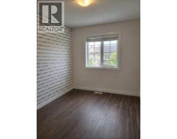 153 Rainbow Falls Manor W, Chestermere, AB T1X0M3 Photo 21