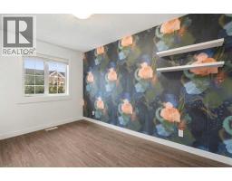 153 Rainbow Falls Manor W, Chestermere, AB T1X0M3 Photo 15