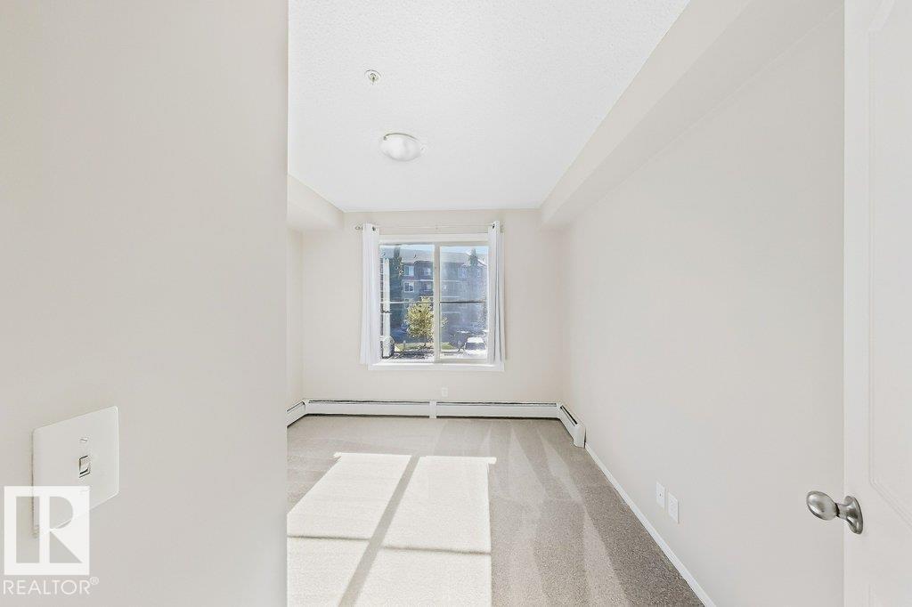 #203 12025 22 AVE SW - 7