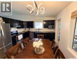 Family room - 119 Hall Crescent, Saskatoon, SK S7L7G7 Photo 9
