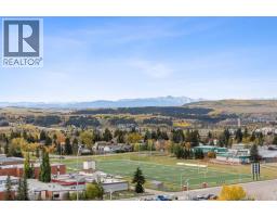 191 Sunterra Ridge Place, Cochrane, AB T4C1W9 Photo 47