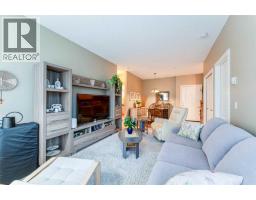 Primary Bedroom - 206, 8 Prestwick Pond Terrace Se, Calgary, AB T2Z4P3 Photo 6
