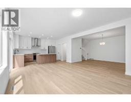 Family room - 302 Baneberry Way Sw, Airdrie, AB T4B5R9 Photo 6