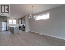 Living room/Dining room - 19733 42 Street Se, Calgary, AB T3M4G4 Photo 11