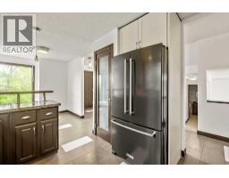 Primary Bedroom - 200 Bernard Drive Nw, Calgary, AB T3K2B7 Photo 10