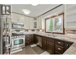 Laundry room - 200 Bernard Drive Nw, Calgary, AB T3K2B7 Photo 7