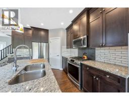Kitchen - 64 Sunrise Terrace, Cochrane, AB T4C0V3 Photo 8