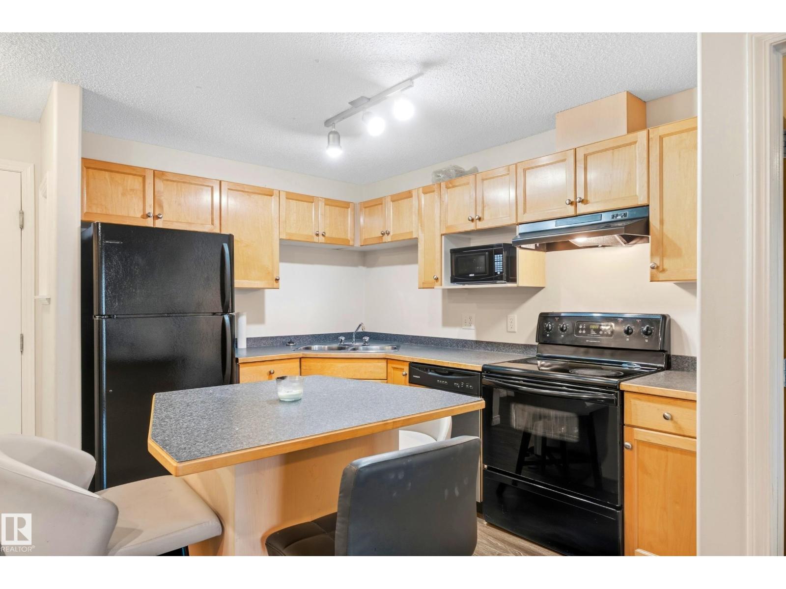 #203 245 EDWARDS DR SW - 16
