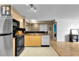 Laundry room - 716, 1111 6 Avenue Sw, Calgary, AB T2P5M5 Photo 7