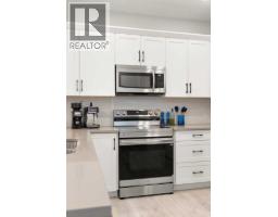 Bedroom - 203 Hamptons Crescent Se, Medicine Hat, AB T1B0P4 Photo 6