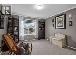 Family room - 34 Mt Aberdeen Link Se, Calgary, AB T2Z3N6 Photo 9