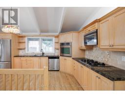 Family room - 19 Blair Athol Crescent, Toronto, ON M9A1X6 Photo 12