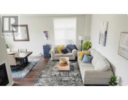 Family room - 100 Trail Boulevard, Springwater, ON L9X0S7 Photo 9