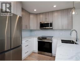 Kitchen - 203 7098 Wallace Dr, Central Saanich, BC V8M1G9 Photo 6