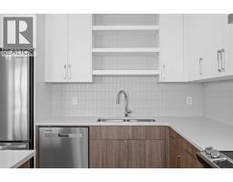 Laundry room - 131 Greenwich Drive Nw, Calgary, AB T3B6K7 Photo 11