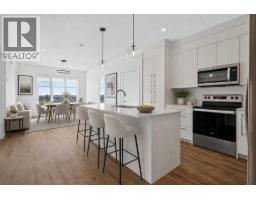 1405, 681 Savanna Boulevard NE - photo 2