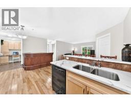 Kitchen - 110, 6315 Ranchview Drive Nw, Calgary, AB T3G1B5 Photo 9