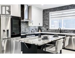 Primary Bedroom - 184 Rowmont Boulevard Nw, Calgary, AB T3L0H3 Photo 6