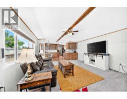 Living room - 130, 6724 17 Avenue Se, Calgary, AB T2A0W5 Photo 6