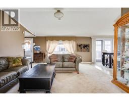 Living room - 125 Elm Street, Fort Mcmurray, AB T9K0J9 Photo 8