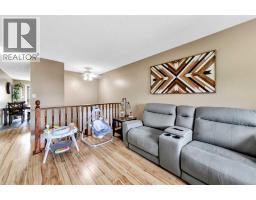 Living room - 4505 30a Street Close, Lloydminster, SK S9V1X3 Photo 6