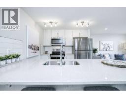 101, 260 Rowley Way Nw, Calgary, AB T3L0H5 Photo 29