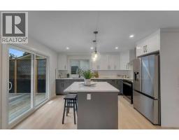 Laundry room - 104 Oakmoor Place Sw, Calgary, AB T2V4A3 Photo 12