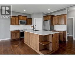 Primary Bedroom - 125 Williamstown Green Nw, Airdrie, AB T4B0S9 Photo 11