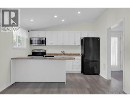 Living room/Dining room - 318 Parr Street, Saint Andrews, NB E5B1M6 Photo 6