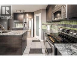 Laundry room - 73 Evansbrooke Way Nw, Calgary, AB T3P1C7 Photo 8