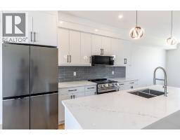 2pc Bathroom - Mccaskill Drive #1931, Crossfield, AB T0M0S0 Photo 6