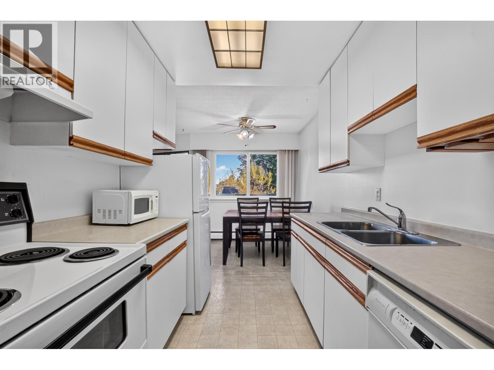 #110 4288 15TH AVENUE - 11