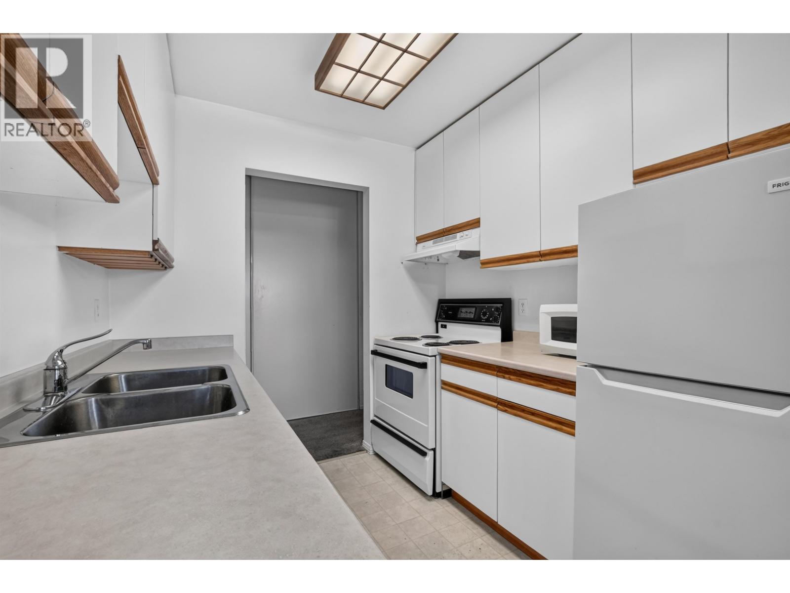 #110 4288 15TH AVENUE - 12