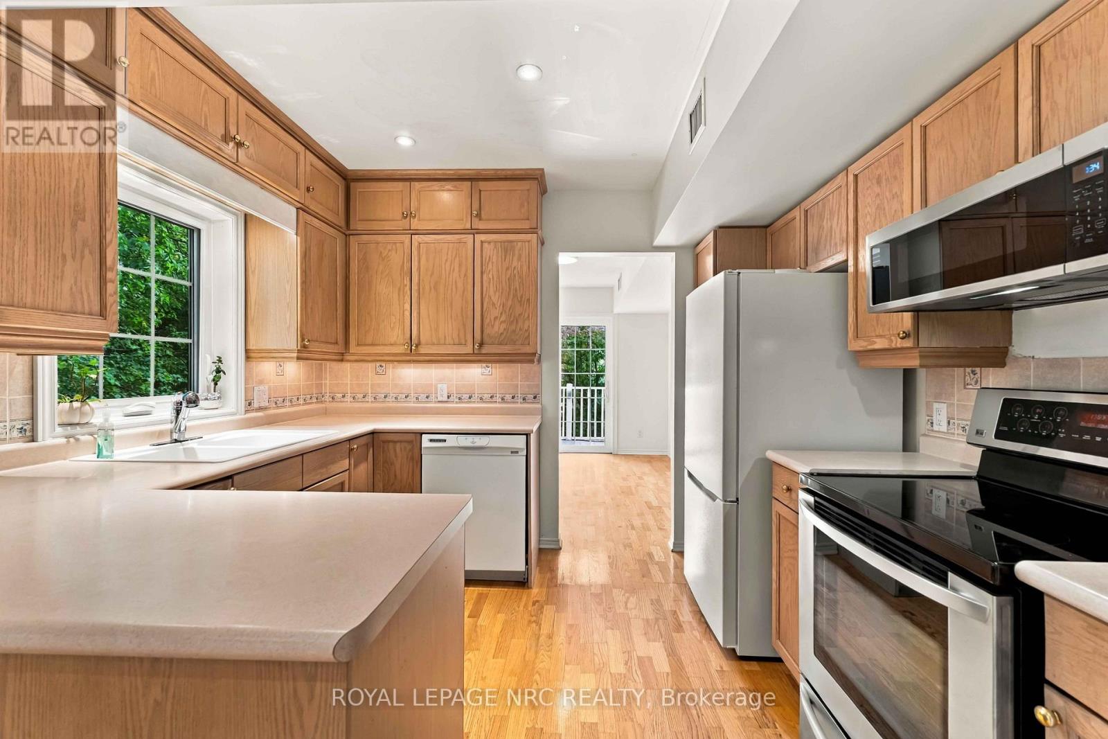 #205 4090 JOHN CHARLES BOULEVARD - Image 18