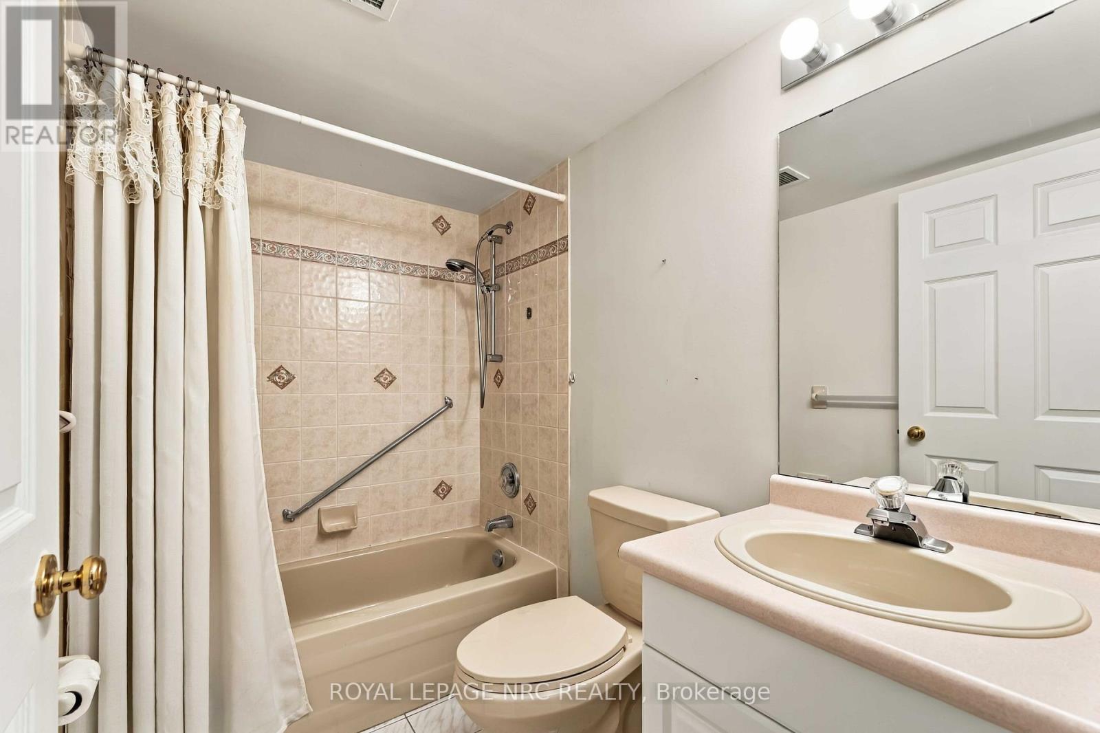 #205 4090 JOHN CHARLES BOULEVARD - 33