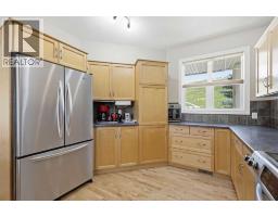 Primary Bedroom - 112, 1000 Glenhaven Way, Cochrane, AB T4C1Y9 Photo 6