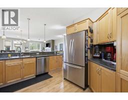 Bedroom - 112, 1000 Glenhaven Way, Cochrane, AB T4C1Y9 Photo 8