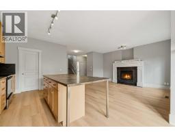 Family room - 16 Cougartown Place Sw, Calgary, AB T3H0A2 Photo 11