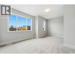 16 Cougartown Place Sw, Calgary, AB T3H0A2 Photo 22