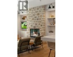 Family room - 50071 Township Road 234, Rural Rocky View County, AB T0L0K0 Photo 11