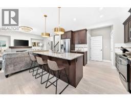 Bedroom - 901, 110 Coopers Common Sw, Airdrie, AB T4B3Y3 Photo 10