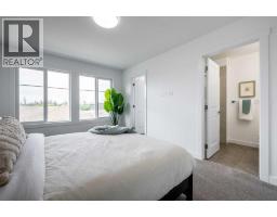 Laundry room - 50 Andalusian Road, Cochrane, AB T4C3B7 Photo 11