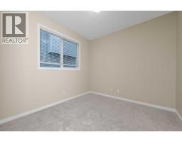 Bedroom - 304 Evanston View Nw, Calgary, AB T3P1G2 Photo 12