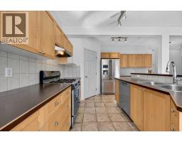 Family room - 254 Panamount Close Nw, Calgary, AB T3K5P6 Photo 14