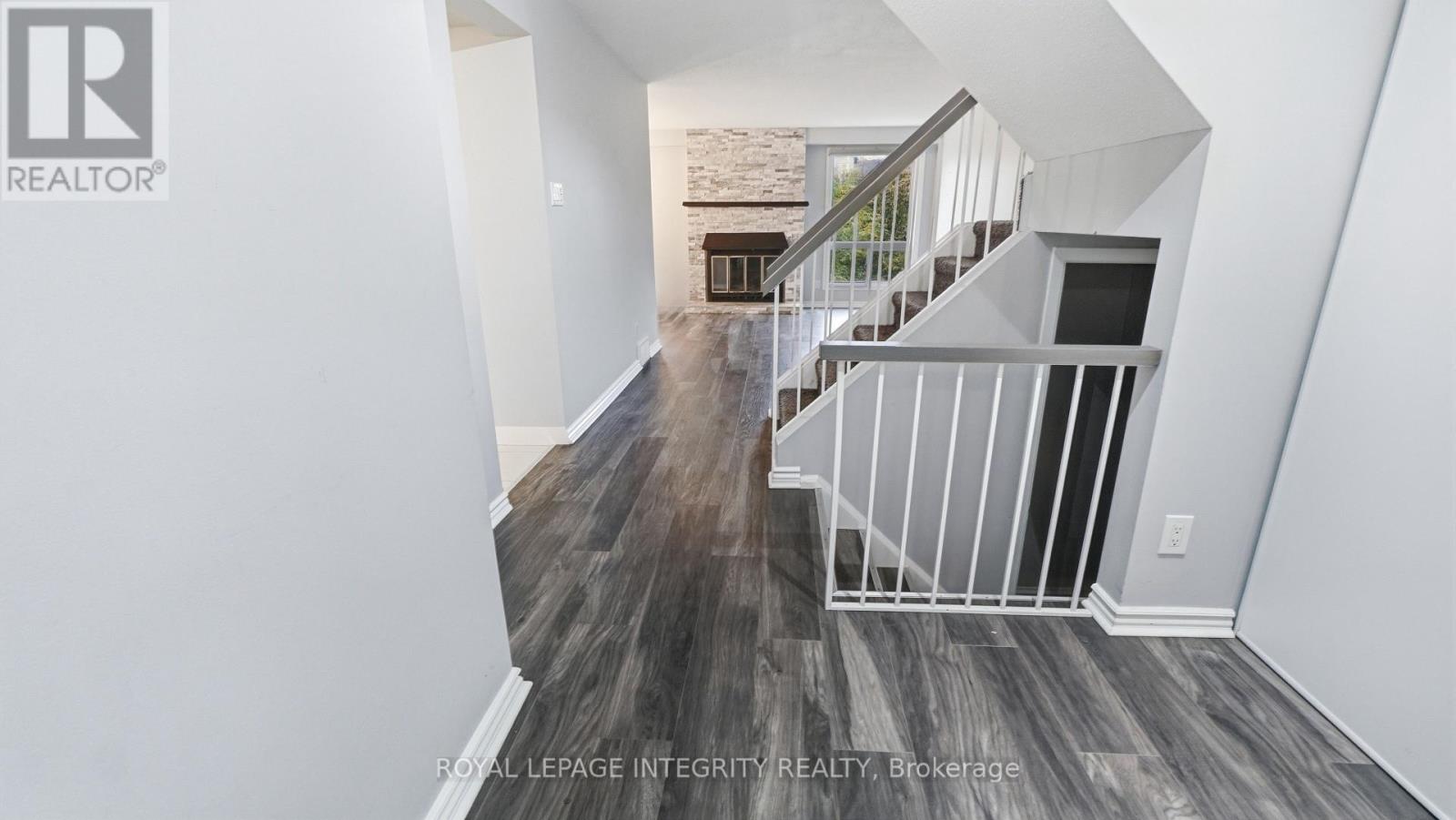 Bright foyer with sleek new flooring